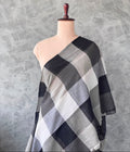Cotton checks fabric with an oversized block check pattern in charcoal black, ash grey and off-white.