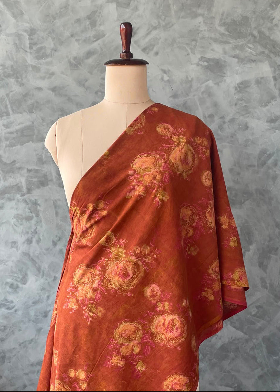 Rust terracotta and deep chocolate brown Jaipur cotton fabric with Ajrakh-style hand-block prints.