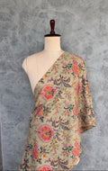 Cotton fabric featuring a floral print for dressmaking and ethnic wear.