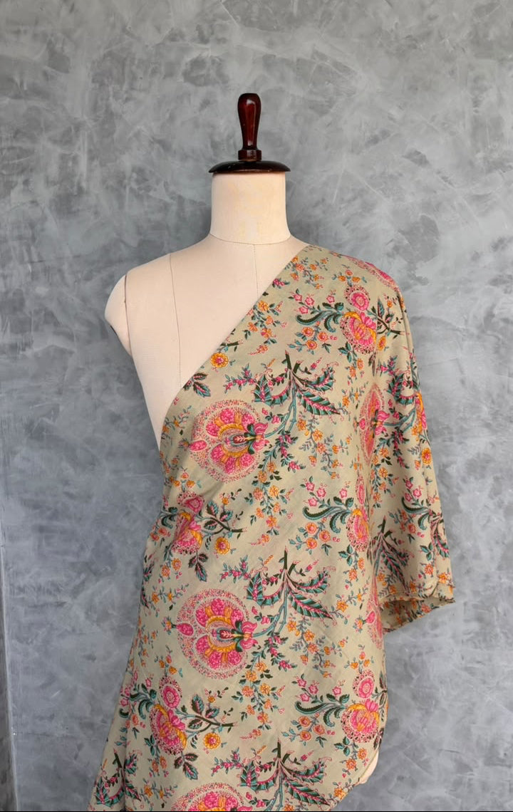 Cotton fabric featuring a floral print for dressmaking and ethnic wear.
